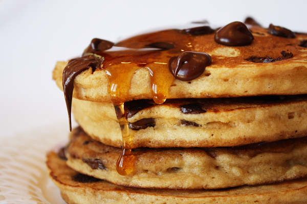 Stack of chocolate chip pancakes with syrup