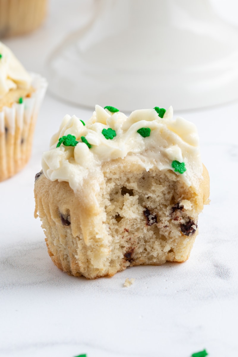 irish cream cupcake with bite taken out of it