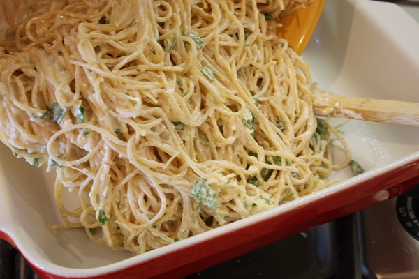 Baked Lemon Spaghetti 12 pouring pasta into pan