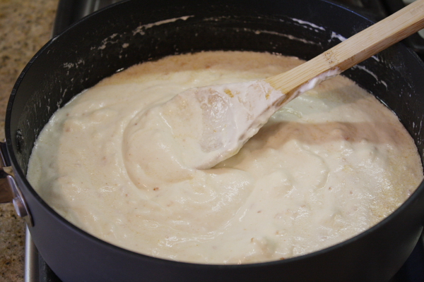Baked Lemon Spaghetti 3 sauce in pan with spoon
