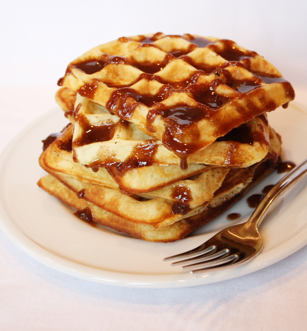 stack of waffles with cinnamon topping