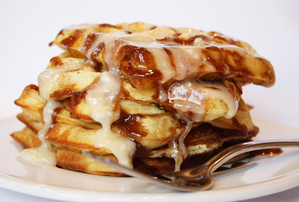 stack of Cinnamon Roll Waffles with Cream Cheese Glaze
