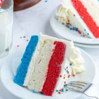 slice of red white and blue cake on plate