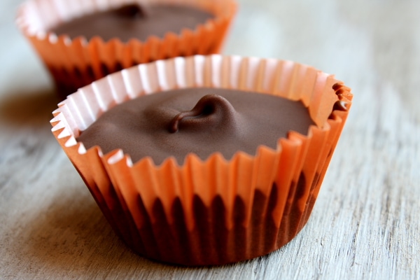 Almond butter cups in paper wrappers
