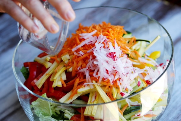 Thai Summer Salad recipe from RecipeGirl.com Adding ingredients to Thai Summer Salad