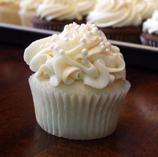 White Wedding Cake Cupcakes frosted with added edible pearls