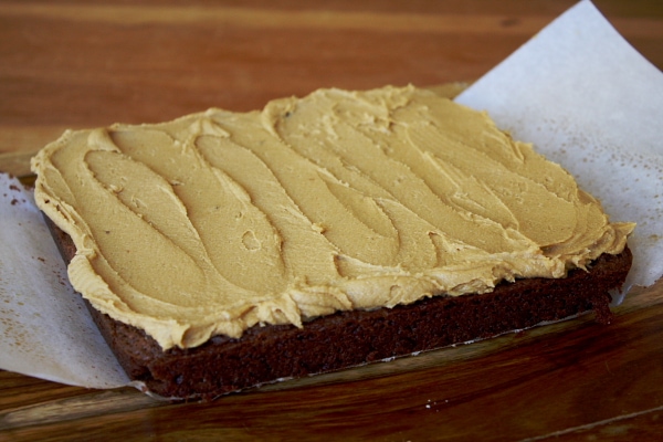 peanut butter cookie dough spread on top of brownie layer