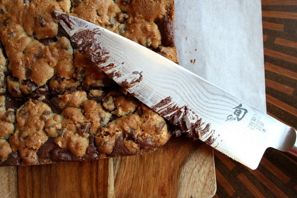 Cutting Gooey Chocolate Chip Sandwich Bars