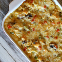 chicken spaghetti casserole in a white dish just out of the oven