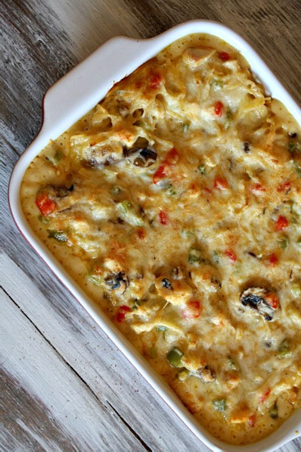 chicken spaghetti casserole in a white dish just out of the oven