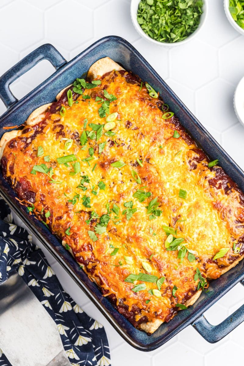 cranberry turkey enchiladas in a pan