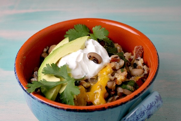 Tex Mex Black Eyed Pea Casserole recipe from RecipeGirl.com #tex #mex #texmex #blackeyedpea #blackeyedpeas #black #eyed #pea #peas #casserole #newyears #newyearsday #lucky #good #luck #goodluck #recipe #RecipeGirl serving of Tex Mex Black Eyed Pea Casserole