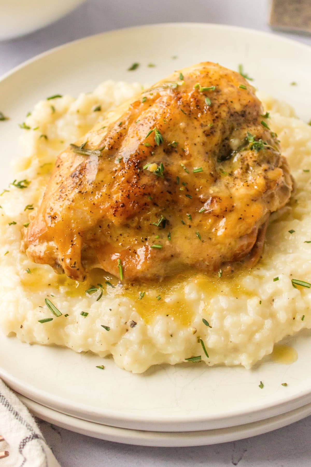 slow cooker garlic chicken on top of risotto