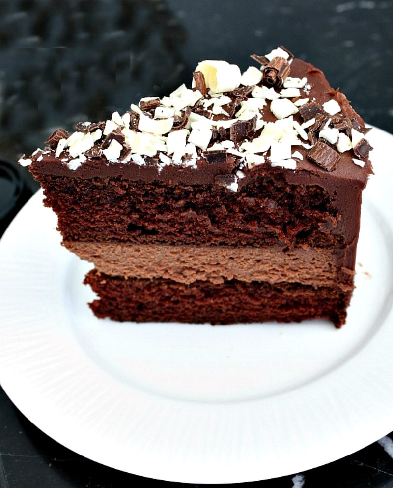 Chocolate Cheesecake Cake recipe from RecipeGirl.com #chocolate #cheesecake #cake #recipe #RecipeGirl Slice of Chocolate Cheesecake Cake