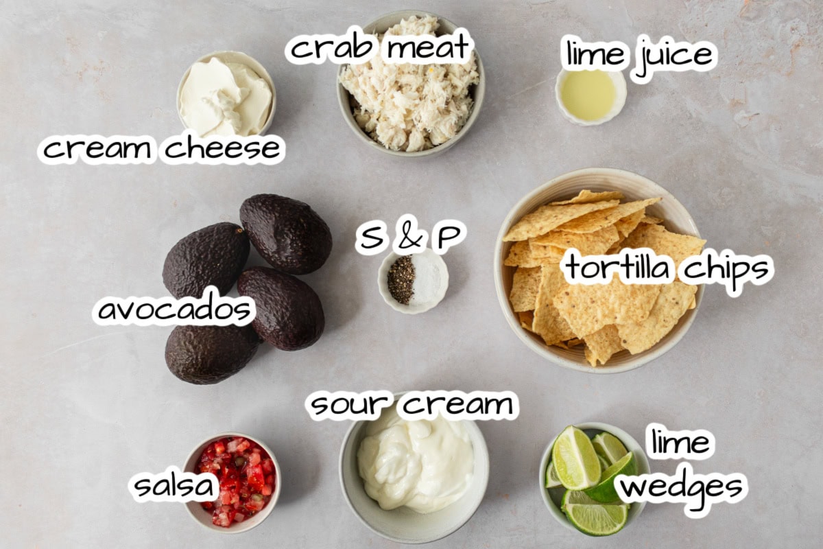 Crab Guacamole is a creamy, fresh twist on classic guacamole with avocado, crab and lime. Easy and perfect for entertaining! ingredients displayed for making crab guacamole