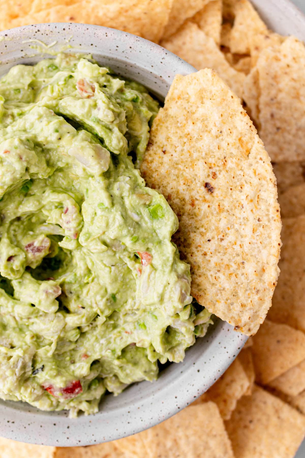 Crab Guacamole is a creamy, fresh twist on classic guacamole with avocado, crab and lime. Easy and perfect for entertaining! chips and crab guacamole