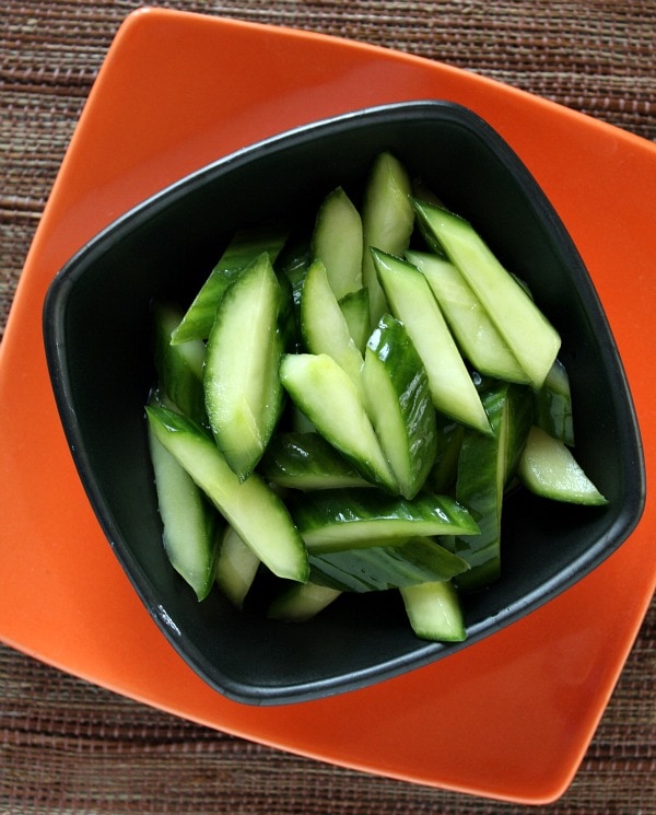 Girl with cucumber