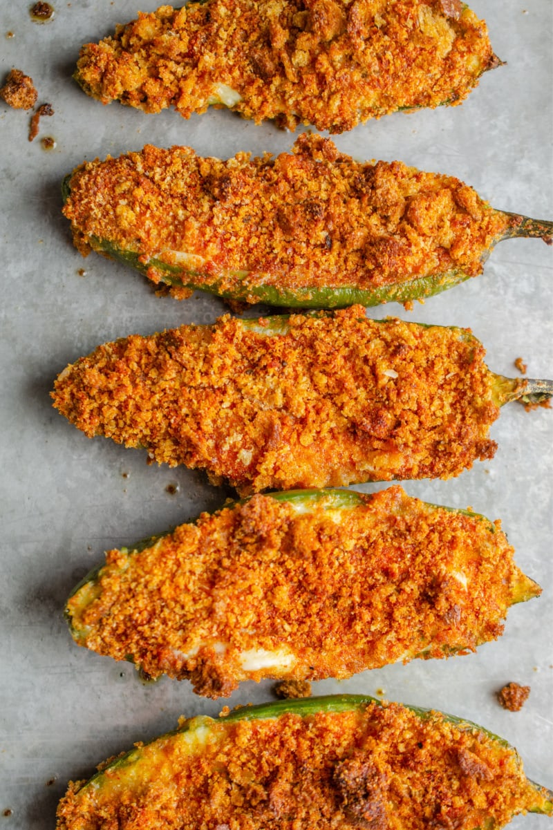 baked jalapeno poppers on baking sheet