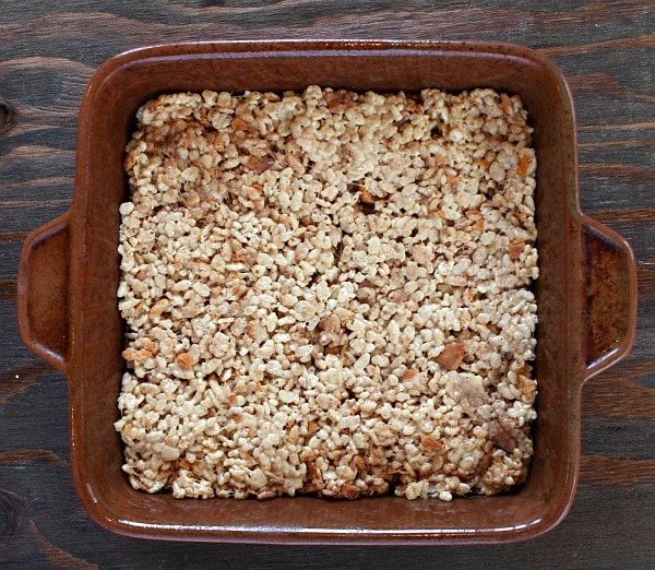 Butterfinger Rice Krispie Treats in a pan