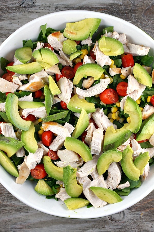 Spinach Salad with Chicken, Avocado and Goat Cheese recipe from RecipeGirl.com #spinach #salad #chicken #avocado #goat #cheese #goatcheese #recipe #RecipeGirl How to Make Spinach Salad with Chicken, Avocado and Goat Cheese