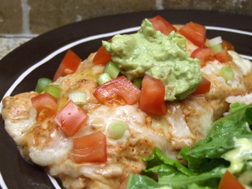 Creamy Chicken Enchiladas on a plate