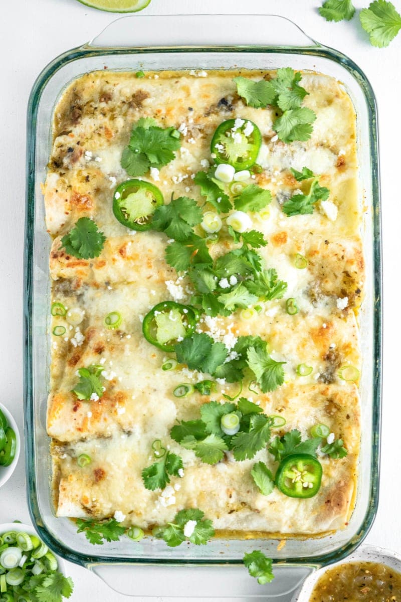 pan of salsa verde chicken enchiladas