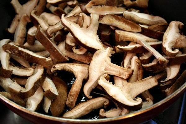 Shiitake and Sweet Pea Risotto 7 adding mushrooms to pan