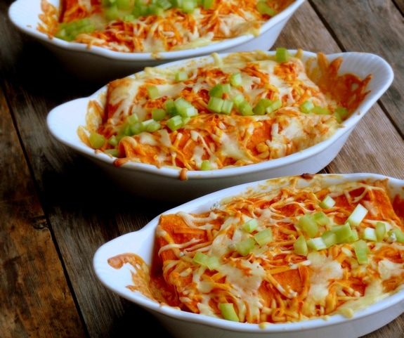 triple cheese buffalo chicken enchiladas in three dishes