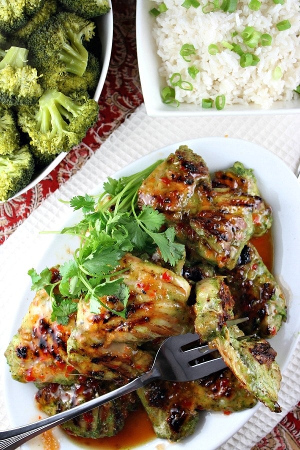 Easy Grilled Cilantro Chicken recipe from RecipeGirl.com #easy #grilled #cilantro #chicken #thighs #recipe #RecipeGirl Cilantro Chicken on platter