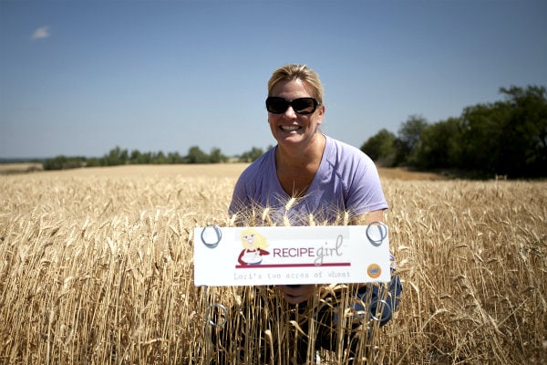 RecipeGirl posing with 2 acres of wheat