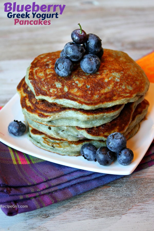 Greek Yogurt Pancakes recipe from RecipeGirl.com #Greek #yogurt #pancakes #recipe #RecipeGirl stack of Blueberry Greek Yogurt Pancakes