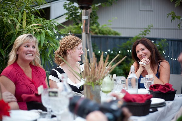 sitting at dinner three girls