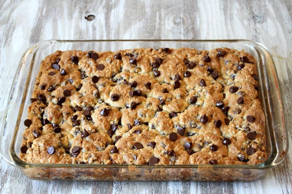 Oreo and Caramel Stuffed Chocolate Chip Cookie Bars in a pyrex dish just out of the oven