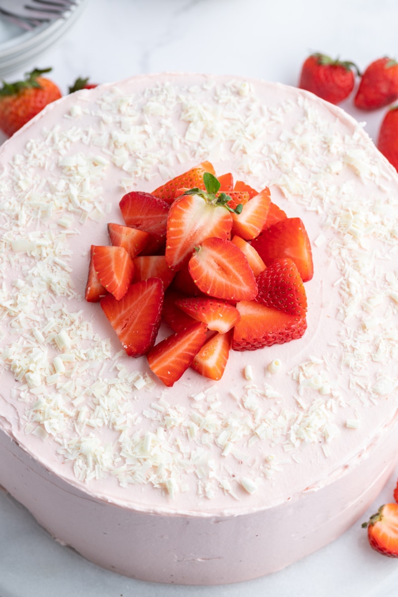 looking down onto strawberry cheesecake cake