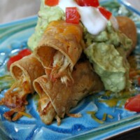Easy Baked Chicken Taquitos on a blue plate