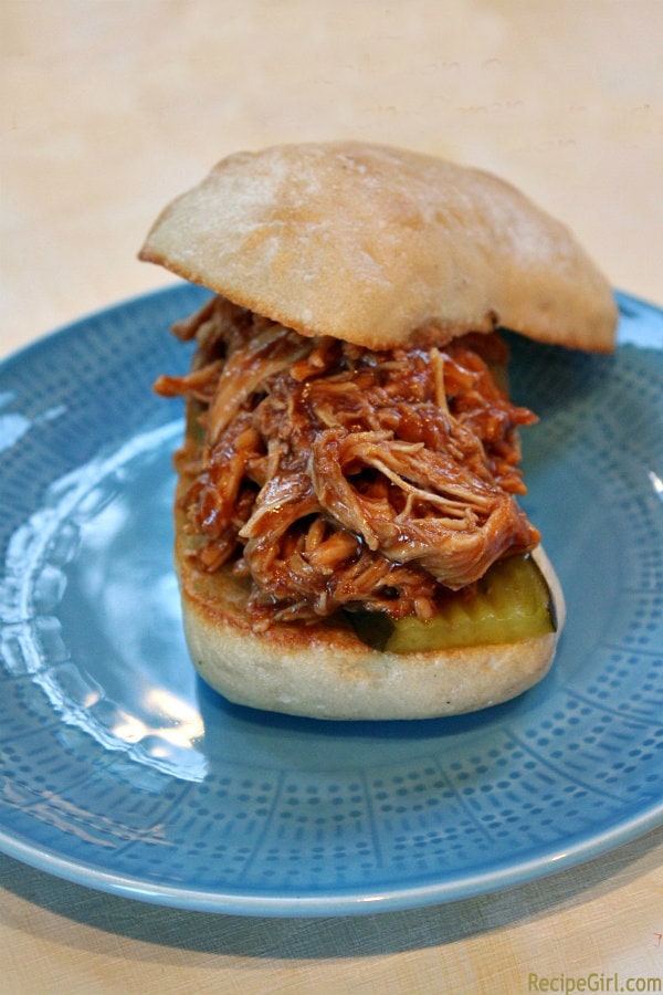 Slow Cooker Pulled Barbecued Chicken Sandwich on a blue plate