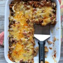 Beef and Bean Enchilada Casserole in a white baking dish