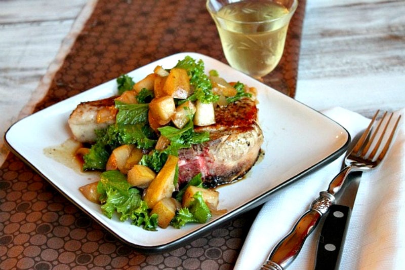 pan seared pork chops with pear on a plate
