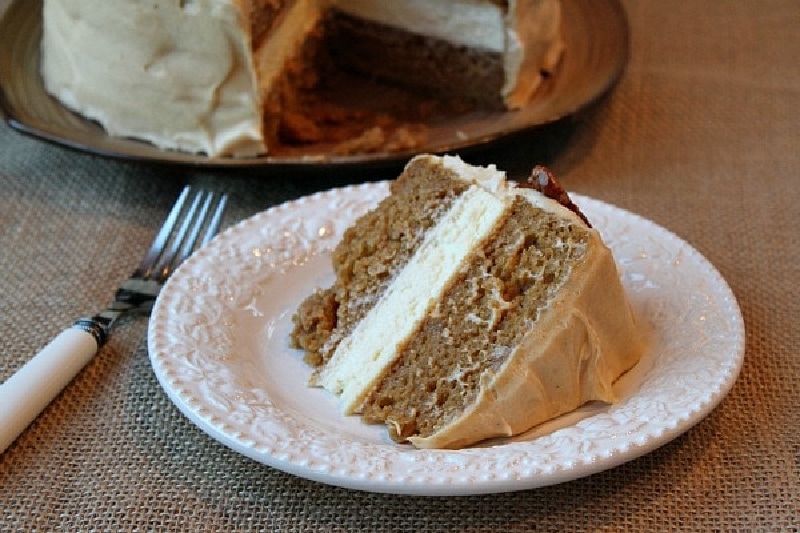 slice of pumpkin cheesecake cake on a white plate