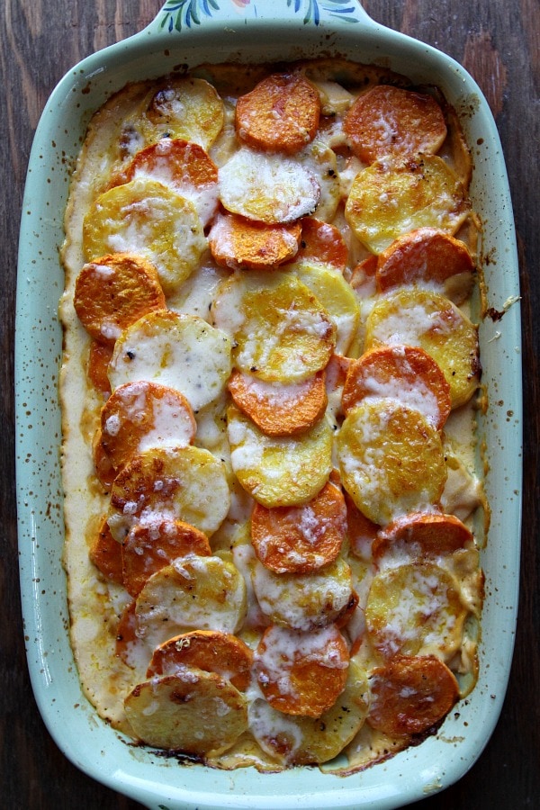 Pumpkin Scalloped Potatoes recipe from RecipeGirl.com #pumpkin #scalloped #potatoes #recipe #RecipeGirl Pumpkin Scalloped Potatoes just out of oven in baking dish