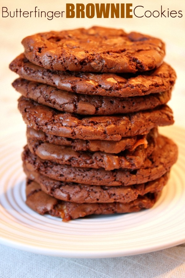 stack of Butterfinger Brownie Cookies on a white plate