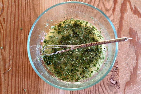 bowl of herbs and olive oil