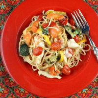 red bowl of baked lemon chicken spaghetti