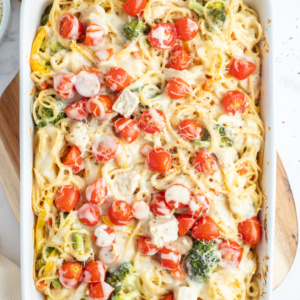 pinterest image for baked lemon chicken spaghetti primavera