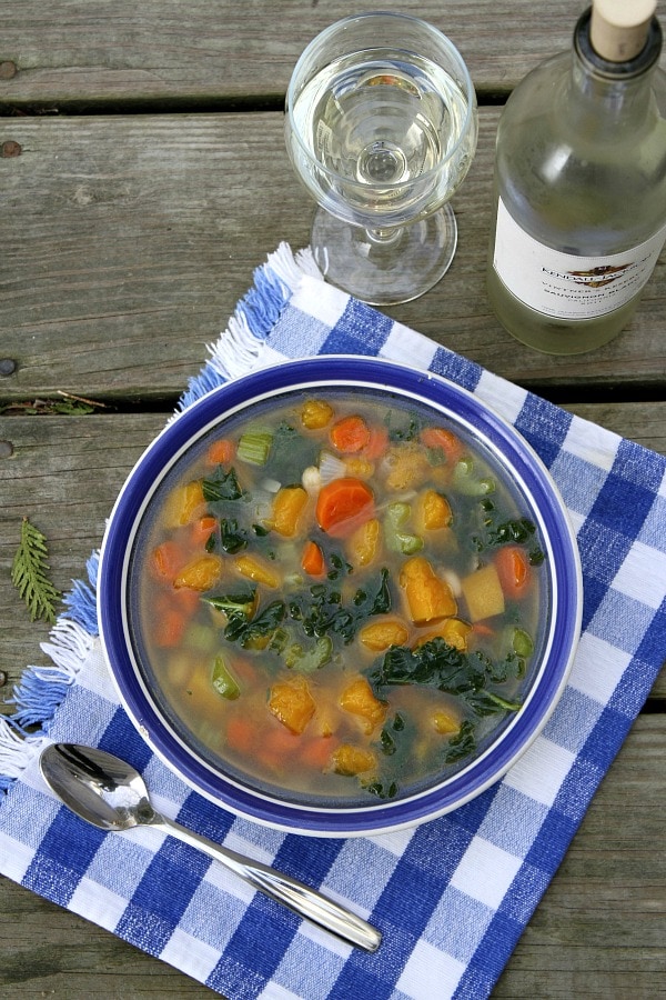 Butternut Squash and Kale Soup recipe from RecipeGirl.com #butternut #squash #butternutsquash #kale #soup #ww #weight #watchers #weightwatchers #recipe #RecipeGirl Butternut Squash and Kale Soup in bowl