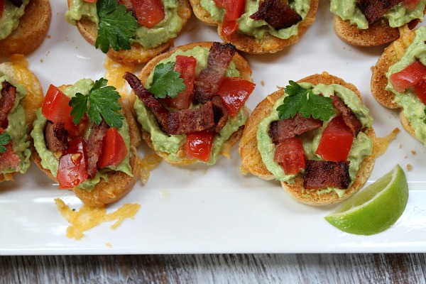 Grilled Cheese Guacamole and Bacon Bruschetta recipe from RecipeGirl.com grilled cheese guacamole and bacon bruschetta on a platter