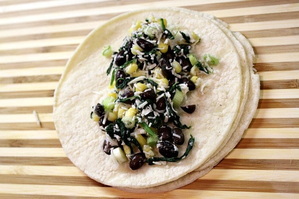 filling vegetable enchiladas