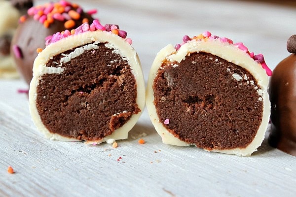 chocolate chocolate chip cookie dough truffles cut in half