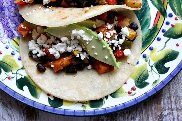 Roasted Vegetable and Black Bean Tacos served on a plate