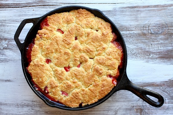 Strawberry Shortcake Skillet Cobbler in a black iron skillet